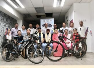 Photo – Two Nepalese cyclists on world tour